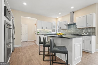 Great community and beautiful 100% updated home in sought after on Collins Hill Golf Club in Georgia - for sale on GolfHomes.com, golf home, golf lot