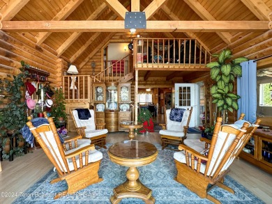 This expansive 5 bed, 3 bath log home offers a perfect blend of on Cedar Creek Golf Course in Wyoming - for sale on GolfHomes.com, golf home, golf lot