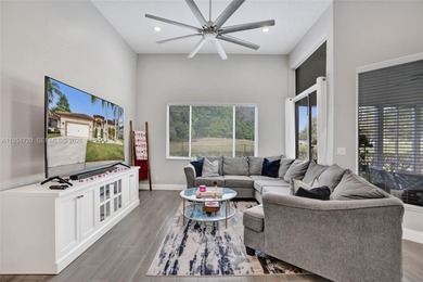 ENJOY LIVING & RELAXING IN THIS GORGEOUS REMODELED HOME WITH on Woodmont Country Club in Florida - for sale on GolfHomes.com, golf home, golf lot