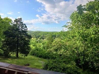 Spectacular view!! This 2/2 home on 2+ acres sits on a bluff on Cherokee Village North Course in Arkansas - for sale on GolfHomes.com, golf home, golf lot