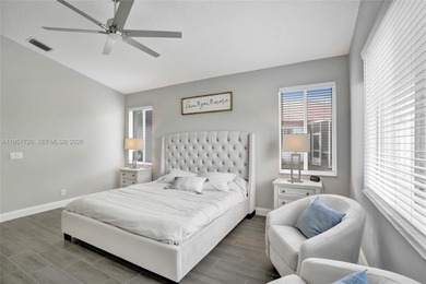 ENJOY LIVING & RELAXING IN THIS GORGEOUS REMODELED HOME WITH on Woodmont Country Club in Florida - for sale on GolfHomes.com, golf home, golf lot