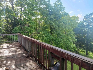 Spectacular view!! This 2/2 home on 2+ acres sits on a bluff on Cherokee Village North Course in Arkansas - for sale on GolfHomes.com, golf home, golf lot