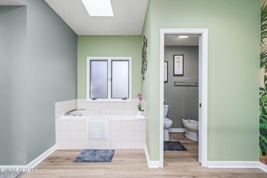 Beautifully Updated Home with views of Druid Hills golf course on Druid Hills Golf Club in Tennessee - for sale on GolfHomes.com, golf home, golf lot