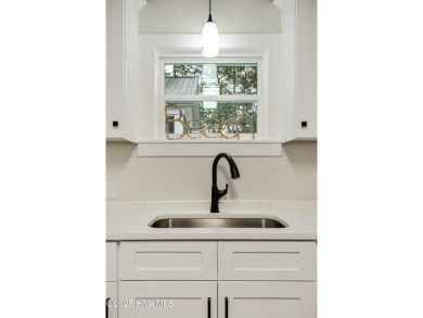 Renovated home with 2 Screened porches!  Enjoy this single-story on Founders Club At St. James Plantation in North Carolina - for sale on GolfHomes.com, golf home, golf lot