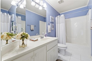 Welcome home to this charming Southern Living style home tucked on The Providence Club in Georgia - for sale on GolfHomes.com, golf home, golf lot