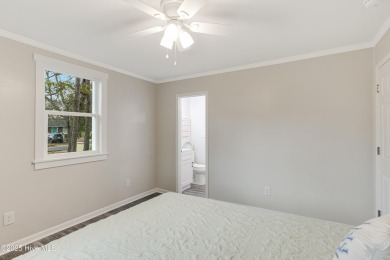 Renovated home with 2 Screened porches!  Enjoy this single-story on Founders Club At St. James Plantation in North Carolina - for sale on GolfHomes.com, golf home, golf lot