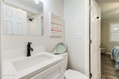 Renovated home with 2 Screened porches!  Enjoy this single-story on Founders Club At St. James Plantation in North Carolina - for sale on GolfHomes.com, golf home, golf lot