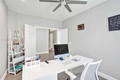 ENJOY LIVING & RELAXING IN THIS GORGEOUS REMODELED HOME WITH on Woodmont Country Club in Florida - for sale on GolfHomes.com, golf home, golf lot