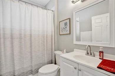 ENJOY LIVING & RELAXING IN THIS GORGEOUS REMODELED HOME WITH on Woodmont Country Club in Florida - for sale on GolfHomes.com, golf home, golf lot