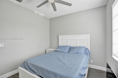 ENJOY LIVING & RELAXING IN THIS GORGEOUS REMODELED HOME WITH on Woodmont Country Club in Florida - for sale on GolfHomes.com, golf home, golf lot