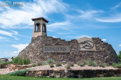 Elevated lot with unobstructed Pikes Peak and Front Range views on The Club At Flying Horse in Colorado - for sale on GolfHomes.com, golf home, golf lot