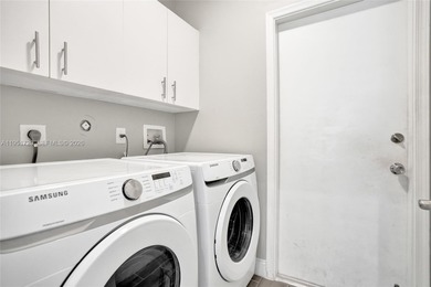 ENJOY LIVING & RELAXING IN THIS GORGEOUS REMODELED HOME WITH on Woodmont Country Club in Florida - for sale on GolfHomes.com, golf home, golf lot