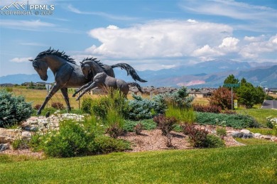 Elevated lot with unobstructed Pikes Peak and Front Range views on The Club At Flying Horse in Colorado - for sale on GolfHomes.com, golf home, golf lot