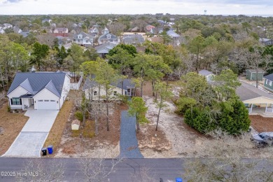 Renovated home with 2 Screened porches!  Enjoy this single-story on Founders Club At St. James Plantation in North Carolina - for sale on GolfHomes.com, golf home, golf lot