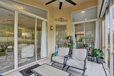 ENJOY LIVING & RELAXING IN THIS GORGEOUS REMODELED HOME WITH on Woodmont Country Club in Florida - for sale on GolfHomes.com, golf home, golf lot
