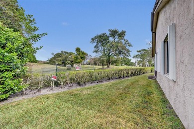 ENJOY LIVING & RELAXING IN THIS GORGEOUS REMODELED HOME WITH on Woodmont Country Club in Florida - for sale on GolfHomes.com, golf home, golf lot