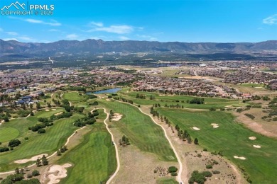 Elevated lot with unobstructed Pikes Peak and Front Range views on The Club At Flying Horse in Colorado - for sale on GolfHomes.com, golf home, golf lot