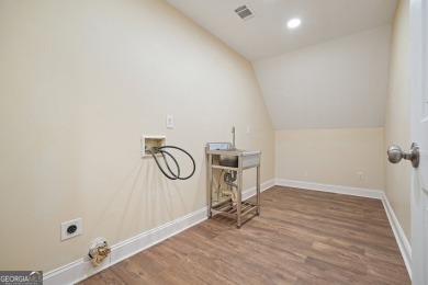 Great community and beautiful 100% updated home in sought after on Collins Hill Golf Club in Georgia - for sale on GolfHomes.com, golf home, golf lot
