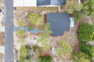 Renovated home with 2 Screened porches!  Enjoy this single-story on Founders Club At St. James Plantation in North Carolina - for sale on GolfHomes.com, golf home, golf lot