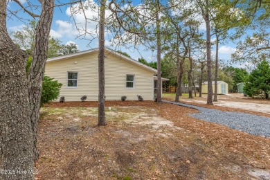 Renovated home with 2 Screened porches!  Enjoy this single-story on Founders Club At St. James Plantation in North Carolina - for sale on GolfHomes.com, golf home, golf lot