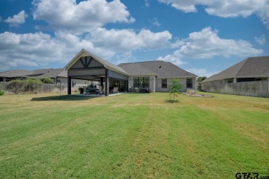 Welcome to an exquisite 2-story home nestled in the serene and on Hide-A-Way Lake Golf Course in Texas - for sale on GolfHomes.com, golf home, golf lot