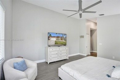 ENJOY LIVING & RELAXING IN THIS GORGEOUS REMODELED HOME WITH on Woodmont Country Club in Florida - for sale on GolfHomes.com, golf home, golf lot