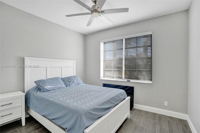 ENJOY LIVING & RELAXING IN THIS GORGEOUS REMODELED HOME WITH on Woodmont Country Club in Florida - for sale on GolfHomes.com, golf home, golf lot