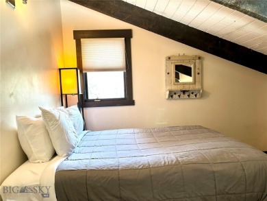 Charming and well-maintained end-unit condo featuring a cozy on Big Sky of Montana Golf Course in Montana - for sale on GolfHomes.com, golf home, golf lot