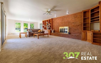 Set on .55 acres along the 16th hole of Olive Glenn Golf Course on Olive Glenn Golf and Country Club in Wyoming - for sale on GolfHomes.com, golf home, golf lot