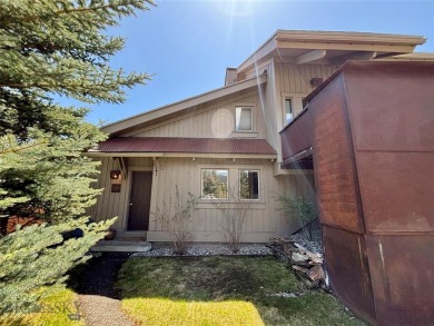Charming and well-maintained end-unit condo featuring a cozy on Big Sky of Montana Golf Course in Montana - for sale on GolfHomes.com, golf home, golf lot