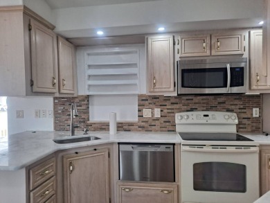 BRAND NEW RENOVATION ! New Kitchen , All Fixtures Including on Riverwood Golf Club in Florida - for sale on GolfHomes.com, golf home, golf lot
