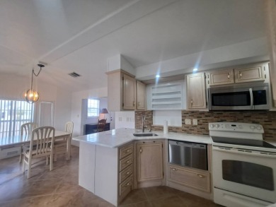 BRAND NEW RENOVATION ! New Kitchen , All Fixtures Including on Riverwood Golf Club in Florida - for sale on GolfHomes.com, golf home, golf lot