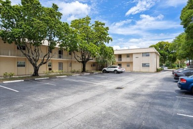 Located in the heart of Palm Beach Gardens, this charming on BallenIsles Golf and Country Club in Florida - for sale on GolfHomes.com, golf home, golf lot