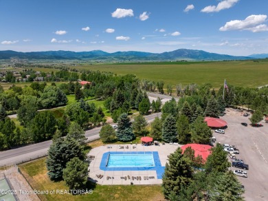 Great RV Pad with mature landscaping, Mountain views,  concrete on Star Valley RV Golf Course in Wyoming - for sale on GolfHomes.com, golf home, golf lot