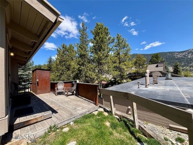 Charming and well-maintained end-unit condo featuring a cozy on Big Sky of Montana Golf Course in Montana - for sale on GolfHomes.com, golf home, golf lot