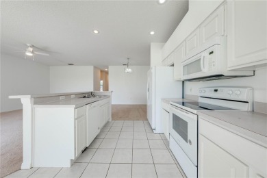 Cozy townhome in a gated community inside of Remington. Seller on Remington Golf Club in Florida - for sale on GolfHomes.com, golf home, golf lot