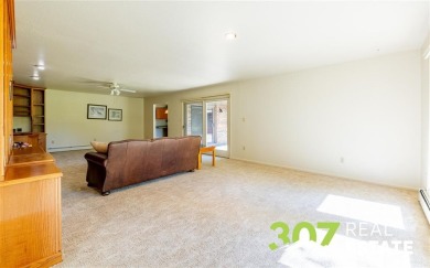 Set on .55 acres along the 16th hole of Olive Glenn Golf Course on Olive Glenn Golf and Country Club in Wyoming - for sale on GolfHomes.com, golf home, golf lot