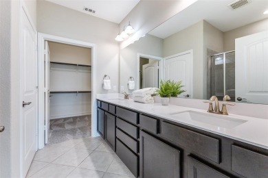 MOVE IN READY.  Immaculate Abbeyville floorplan in Frisco Lakes on Frisco Lakes Golf Course in Texas - for sale on GolfHomes.com, golf home, golf lot