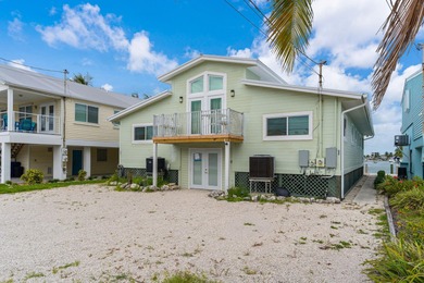 Full Duplex - A Fantastic Investment Opportunity! Live in one on Key Colony Beach Golf Course in Florida - for sale on GolfHomes.com, golf home, golf lot
