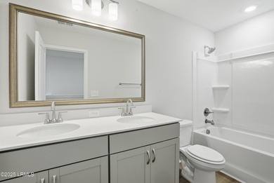 Our most sought after plan, the Roland II, boasts four bedrooms on Ladys Island Country Club in South Carolina - for sale on GolfHomes.com, golf home, golf lot