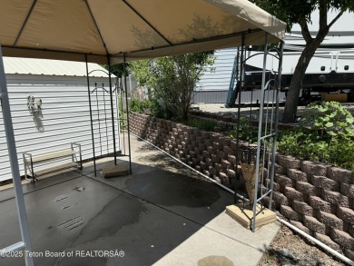 Great RV Pad with mature landscaping, Mountain views,  concrete on Star Valley RV Golf Course in Wyoming - for sale on GolfHomes.com, golf home, golf lot