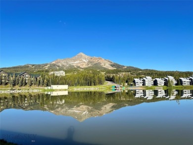 Charming and well-maintained end-unit condo featuring a cozy on Big Sky of Montana Golf Course in Montana - for sale on GolfHomes.com, golf home, golf lot