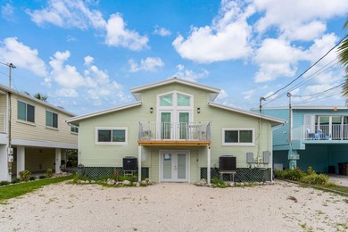 Full Duplex - A Fantastic Investment Opportunity!Live in one on Key Colony Beach Golf Course in Florida - for sale on GolfHomes.com, golf home, golf lot