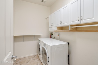 This well-appointed 2009 Riva model is located on a corner lot on Quail Creek Country Club  in Arizona - for sale on GolfHomes.com, golf home, golf lot