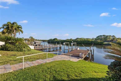 WATERFRONT POOL HOME with DIRECT BAY  GULF ACCESS in the GATED on Rocky Point Golf Course in Florida - for sale on GolfHomes.com, golf home, golf lot