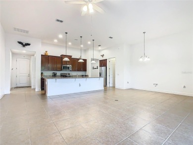 One or more pictures are virtually staged.  Great Savona model on Stonegate Golf Club in Florida - for sale on GolfHomes.com, golf home, golf lot