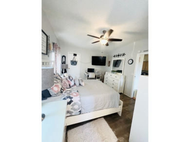 This charming two-bedroom, two-bathroom home is nestled in a on Pine Lakes Country Club in Florida - for sale on GolfHomes.com, golf home, golf lot