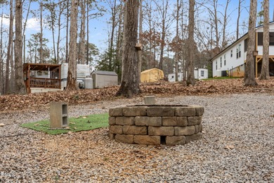 Come see this well-maintained 2017 park model camper located on on River Golf and Country Club at Lake Royale in North Carolina - for sale on GolfHomes.com, golf home, golf lot