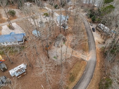 Come see this well-maintained 2017 park model camper located on on River Golf and Country Club at Lake Royale in North Carolina - for sale on GolfHomes.com, golf home, golf lot