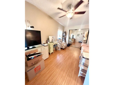 This charming two-bedroom, two-bathroom home is nestled in a on Pine Lakes Country Club in Florida - for sale on GolfHomes.com, golf home, golf lot